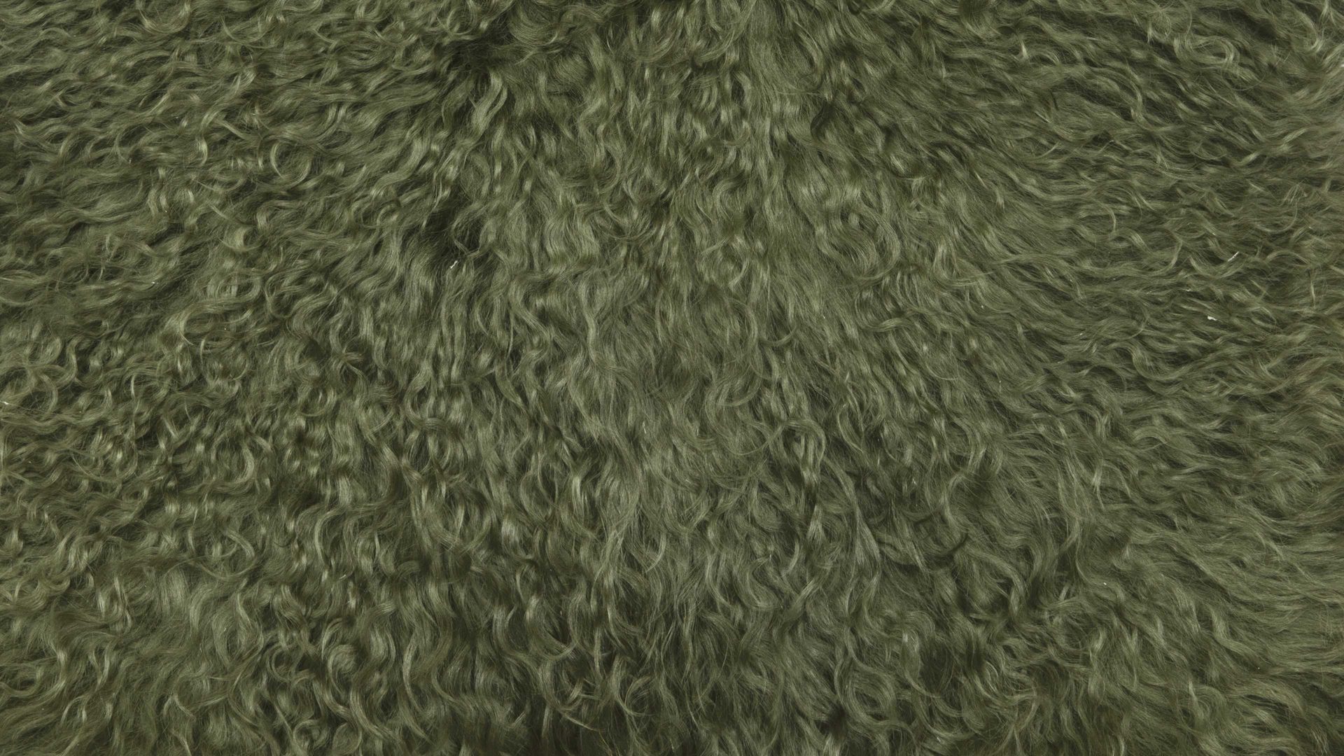 Kissenbezug /-hülle Magma sitting point aus Fell in Dunkelgrün MAGMA Kissenhülle Pamina dunkelgrünes Tibet-Lammfell - ca. 40 x 40 cm